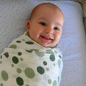 Happy Swaddled Baby - How and why to swaddle your infant